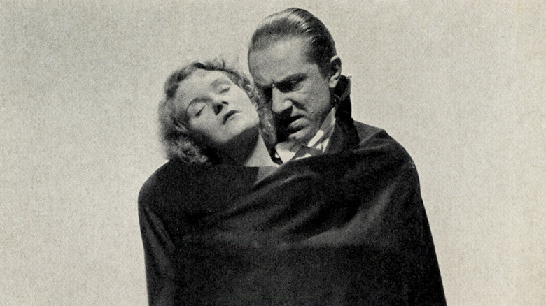 Dracula embracing female vicrtim