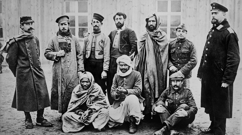 Allied POWs in a variety of uniforms at a prison camp in Zossen, Germany