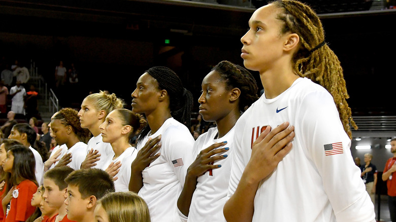 Brittney Griner standing for the national anthem