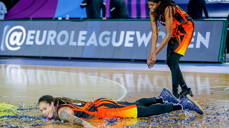 Brittney Griner celebrates on ground