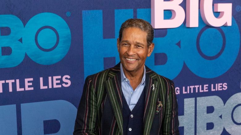 Bryant Gumbel HBO event striped suit smiling