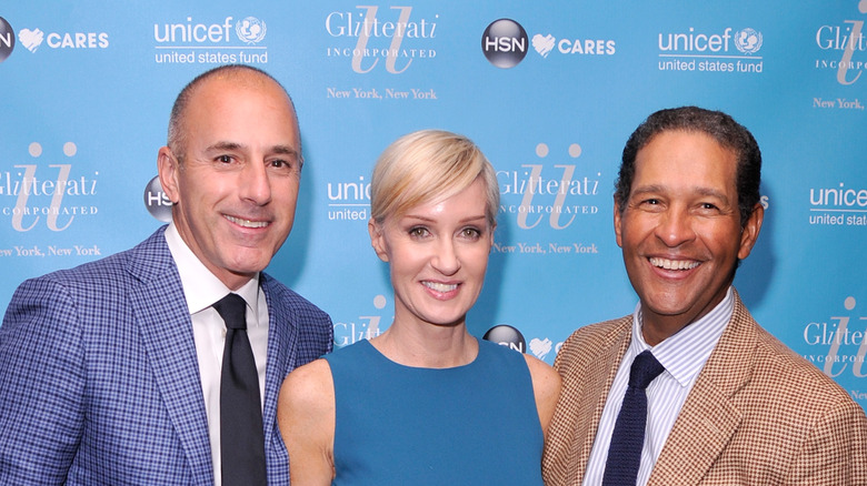 Matt Lauer with Hilary and Bryant Gumbel smiling at event