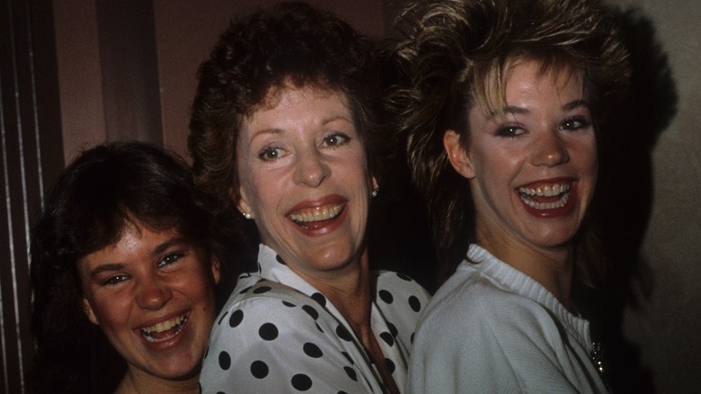 Carol Burnett with daughters smiling 