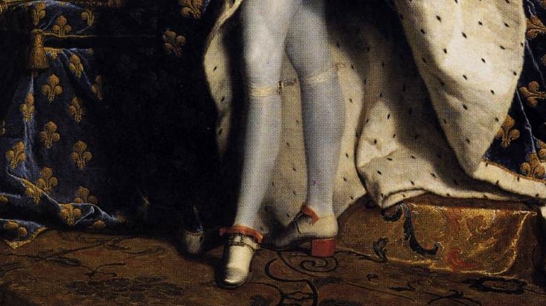 King Louis XIV in high-heeled shoes