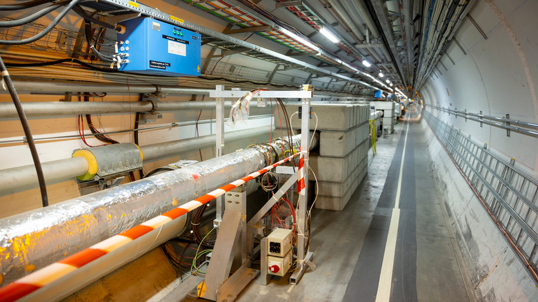 large hadron collider tunnel with pipes