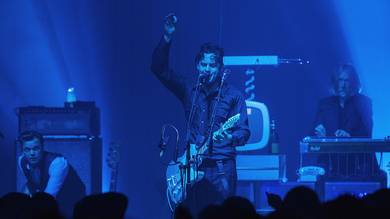 Jack White playing guitar