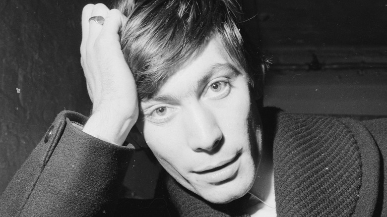 Charlie Watts posing for camera