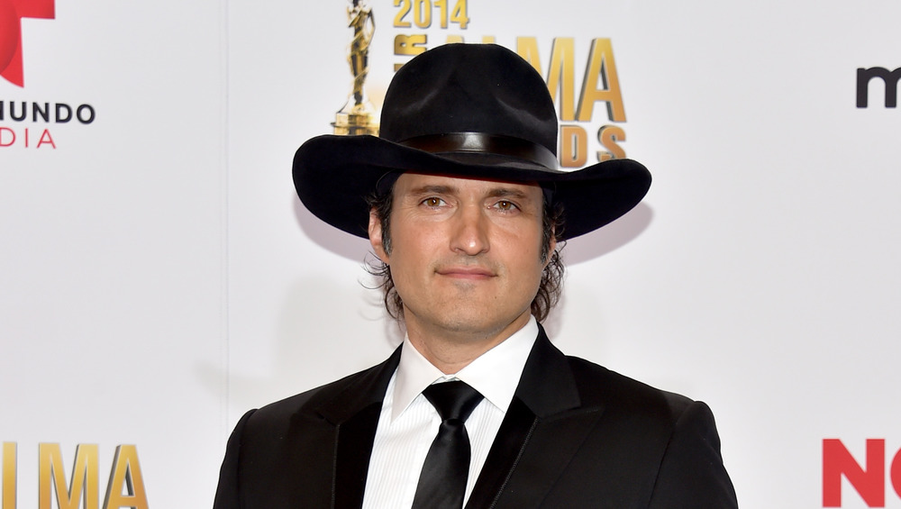 Robert Rodriguez in a black hat