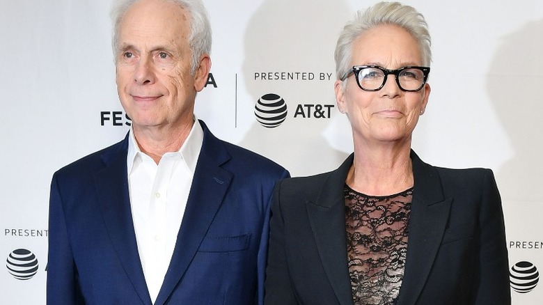 Christopher Guest and Jamie Lee Curtis smiling