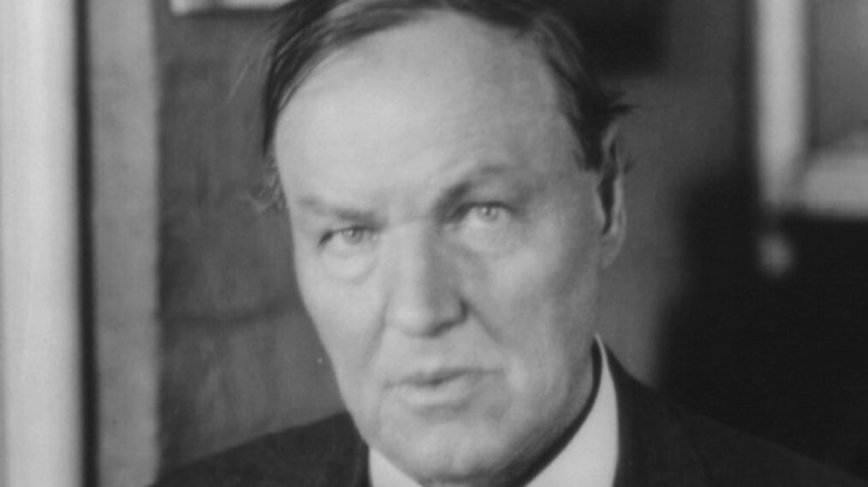 Clarence Darrow sitting in a chair