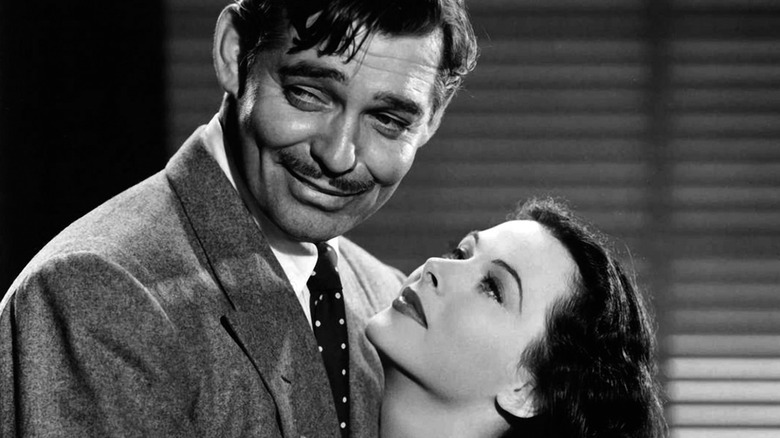 Hedy Lamarr gazing up at Clark Gable