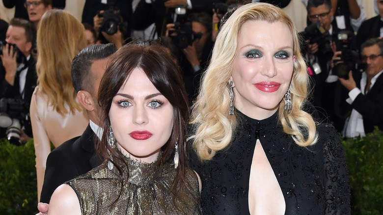 Courtney Love and Frances Bean Cobain in black