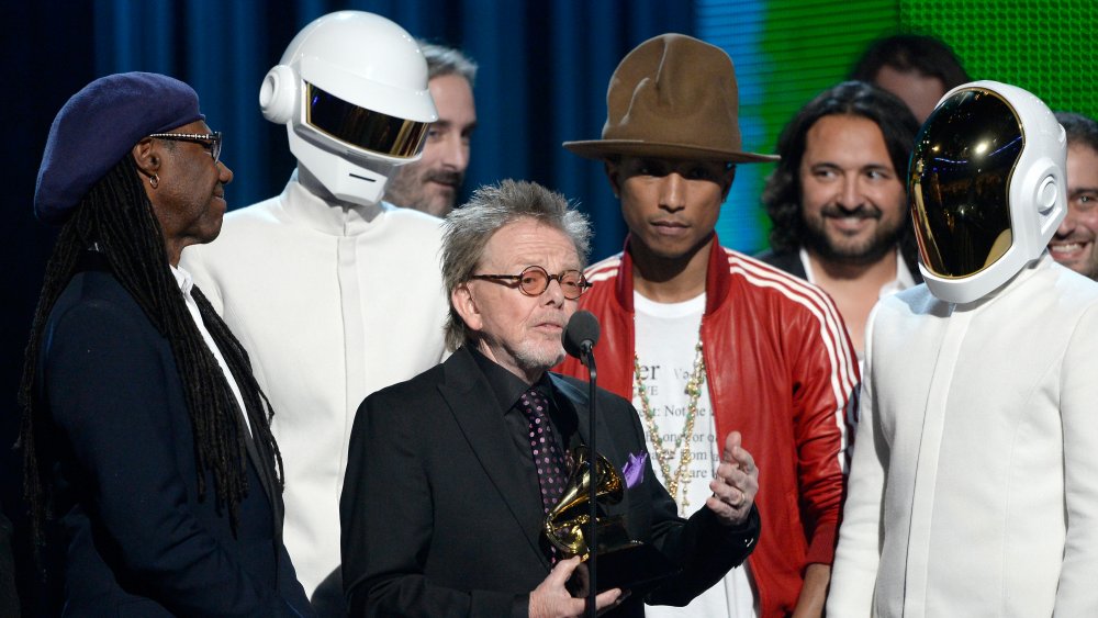 A photograph of Daft Punk and Pharrell Williams accepting their Grammy Award.