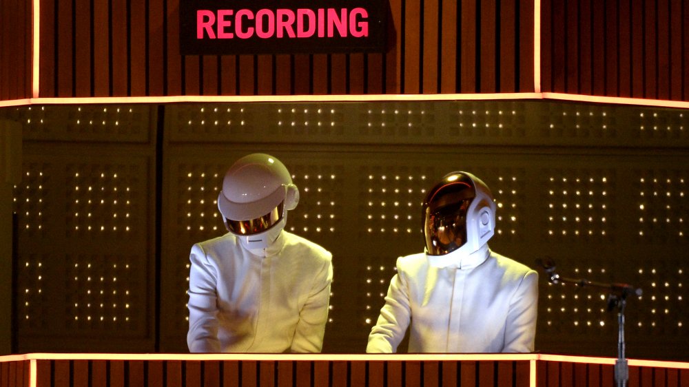 A photograph of Daft Punk in a recording studio.