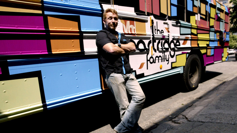 Danny Bonaduce in front of the Patridge family bus