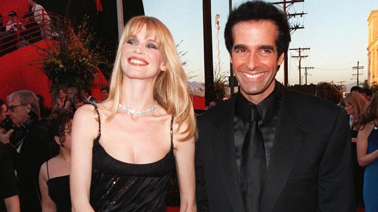 David Copperfield Chloe Gosselin smiling together at event