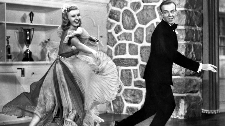 Ginger Rogers and Fred Astaire dancing evening dress