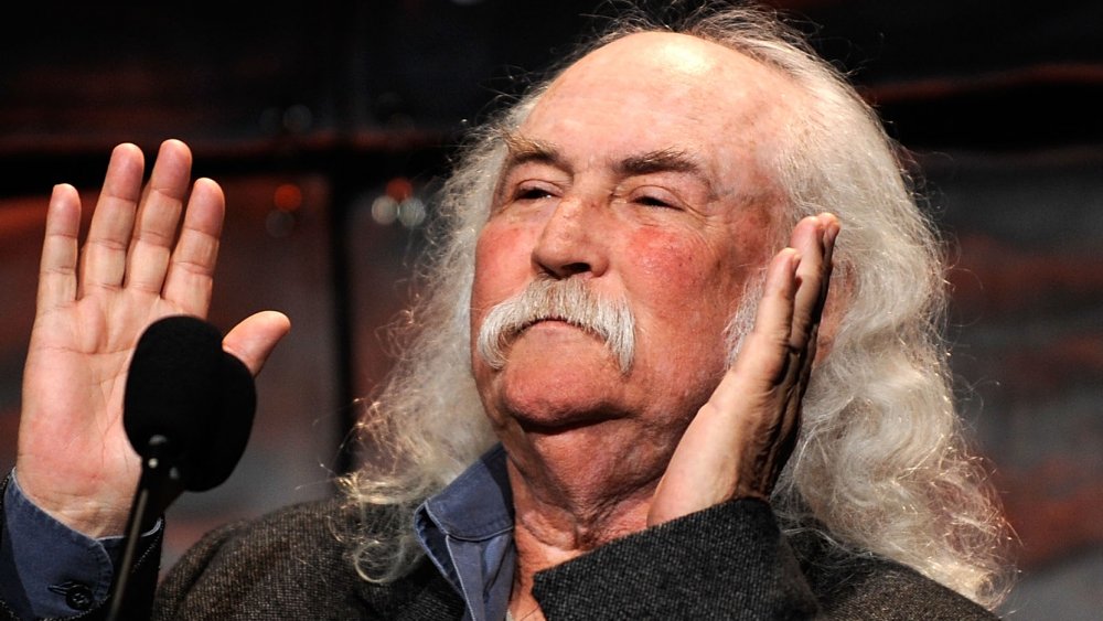 David Crosby waving