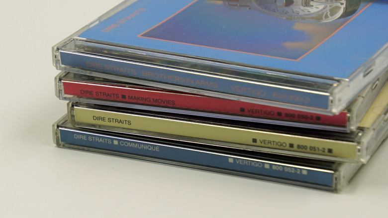 Dire Straits CDs on table