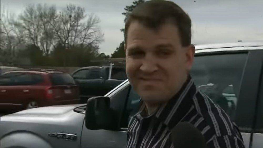 Dr. Christopher Duntsch, smirking at a reporter