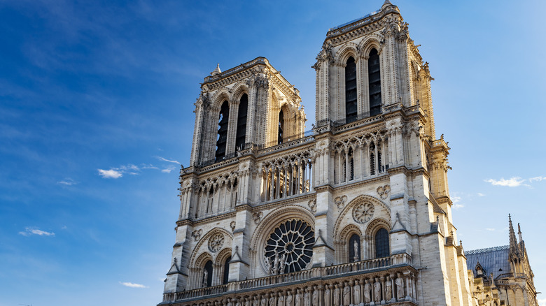 Sunlight hits Notre Dame from the right