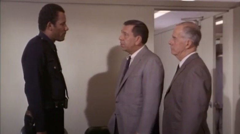 Friday and Gannon consult with a uniformed officer on a 1967 episode of "Dragnet."