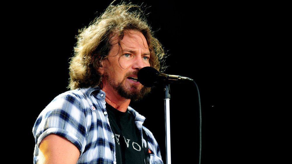 Eddie Vedder on stage mic singing 