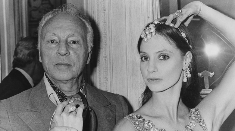 George Balanchine posing with dancer