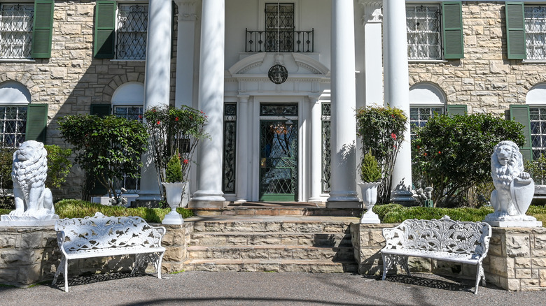 Stone lions guard the door to Graceland