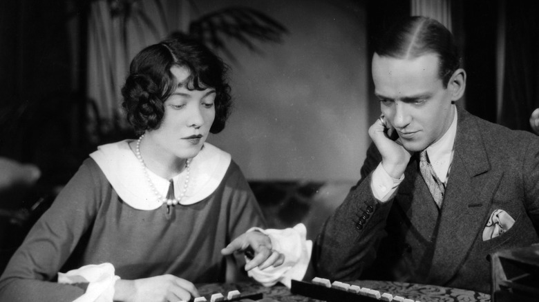 Adele and Fred Astaire playing a game