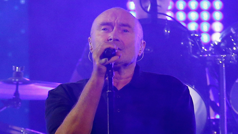 Phil Collins singing in concert