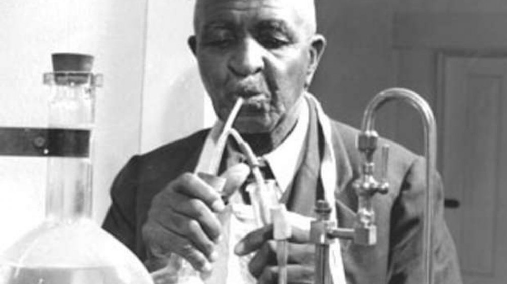 George Washington Carver working in his lab