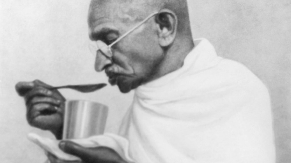 Mahatma Gandhi eating