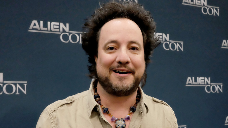 Giorgio A. Tsoukalos wearing necklace