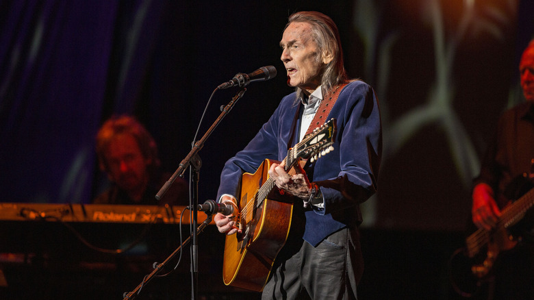 Gordon Lightfoot performing on stage