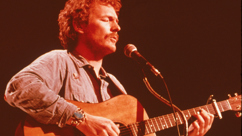 Gordon Lightfoot performing on stage