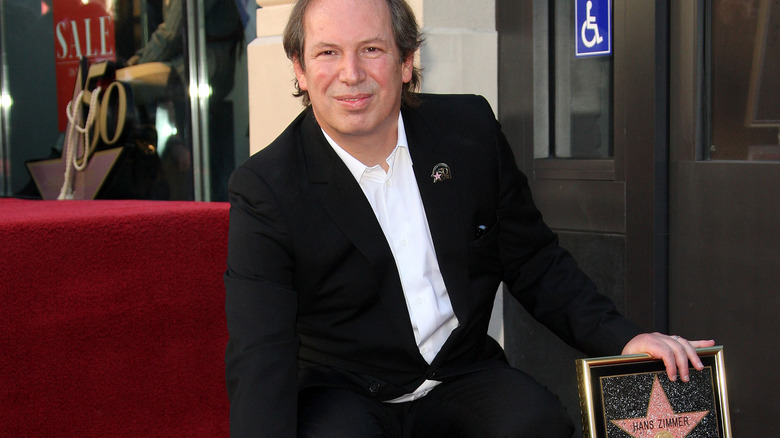 Hans Zimmer kneeling Hollywood Walk of Fame