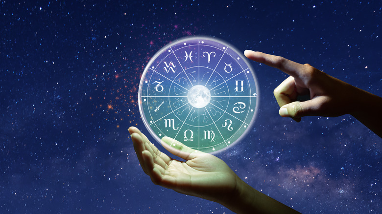 Astrology symbols and hands