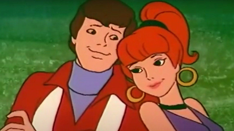 Corey and Jeannie cuddle as cartoon