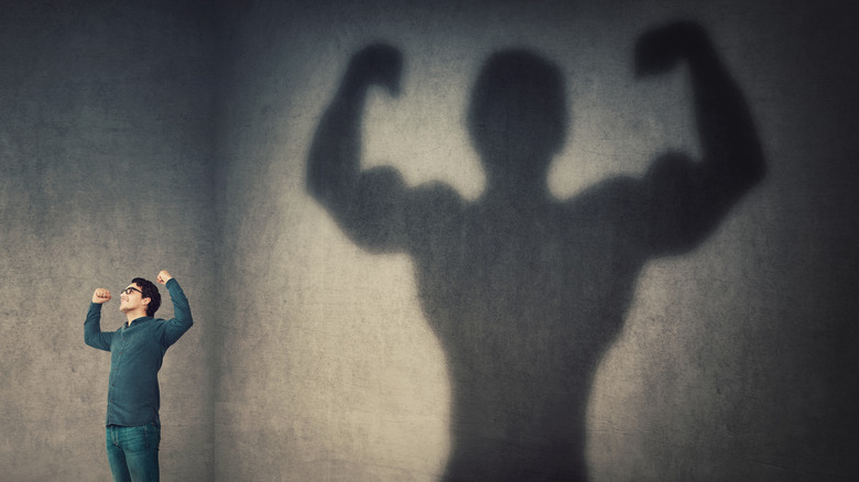 A muscularly exaggerated shadow