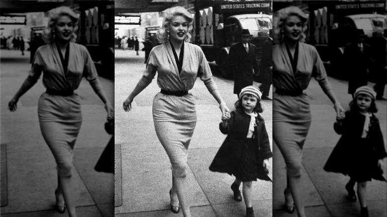 Jayne Mansfield walking with daughter