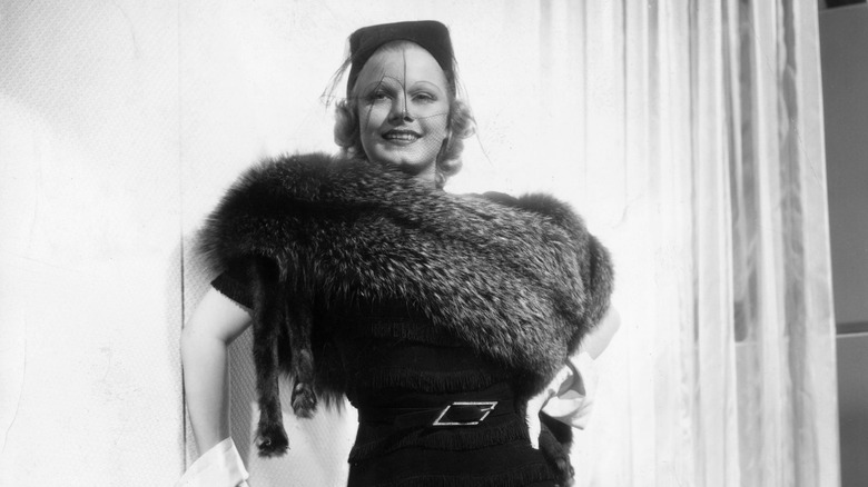 Jean Harlow posing in furs