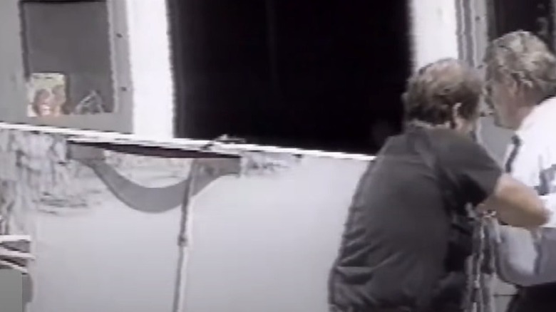 Workers removing Jeffrey Dahmer's refrigerator