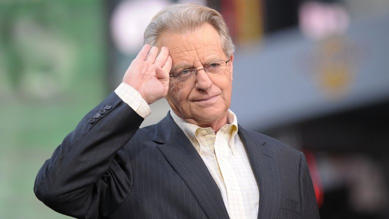 Jerry Springer saluting