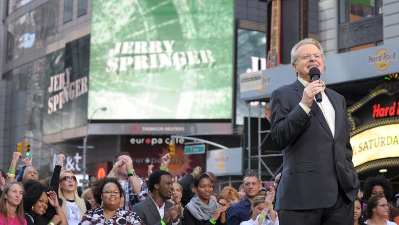 Jerry Springer speaking to a crowd outside