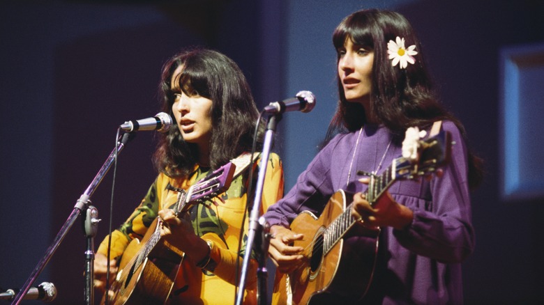 Joan Baez performing with her sister Mimi Farina