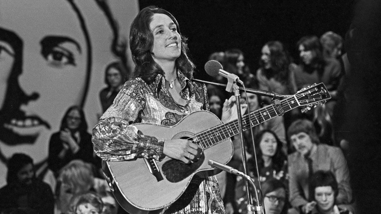 Joan Baez performing on stage