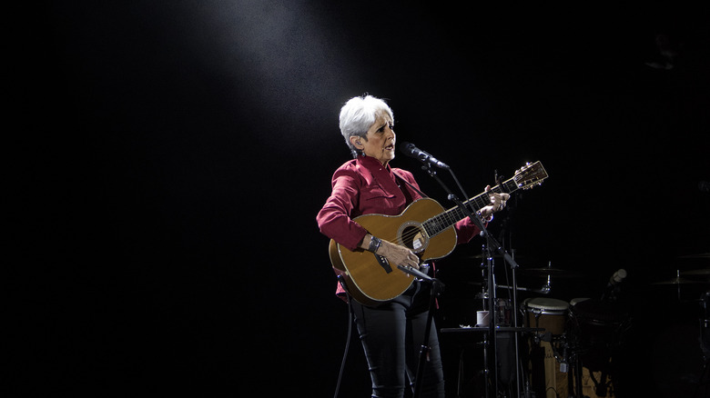 Joan Baez performing on stage