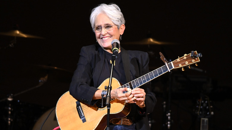 Joan Baez onstage at a 2024 benefit show