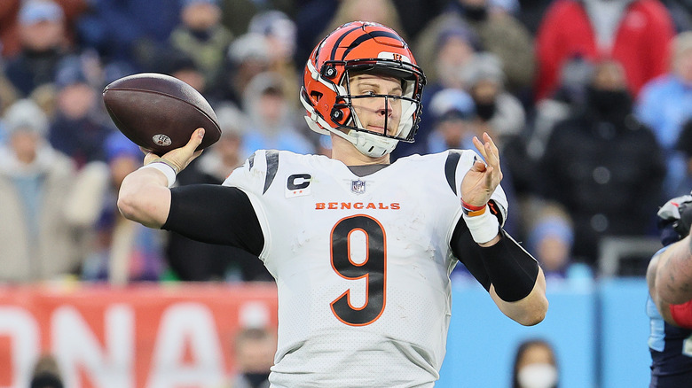 Burrow throwing a football